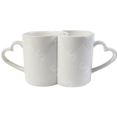 Taza de cerámica 11oz. Blanca. Pareja con asa de Corazón ColorMake